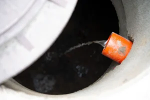 Sewer camera inspection showing blockage compared to structural pipe damage
