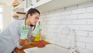 Wastewater backing up through multiple connected drains in an Edmonton property